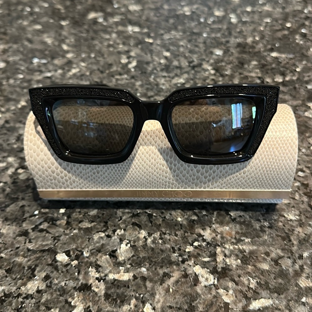Jimmy Choo black with subtle sparkles rectangular sunglasses with case.